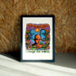 Change wall art by Jake Foreman in a black frame
