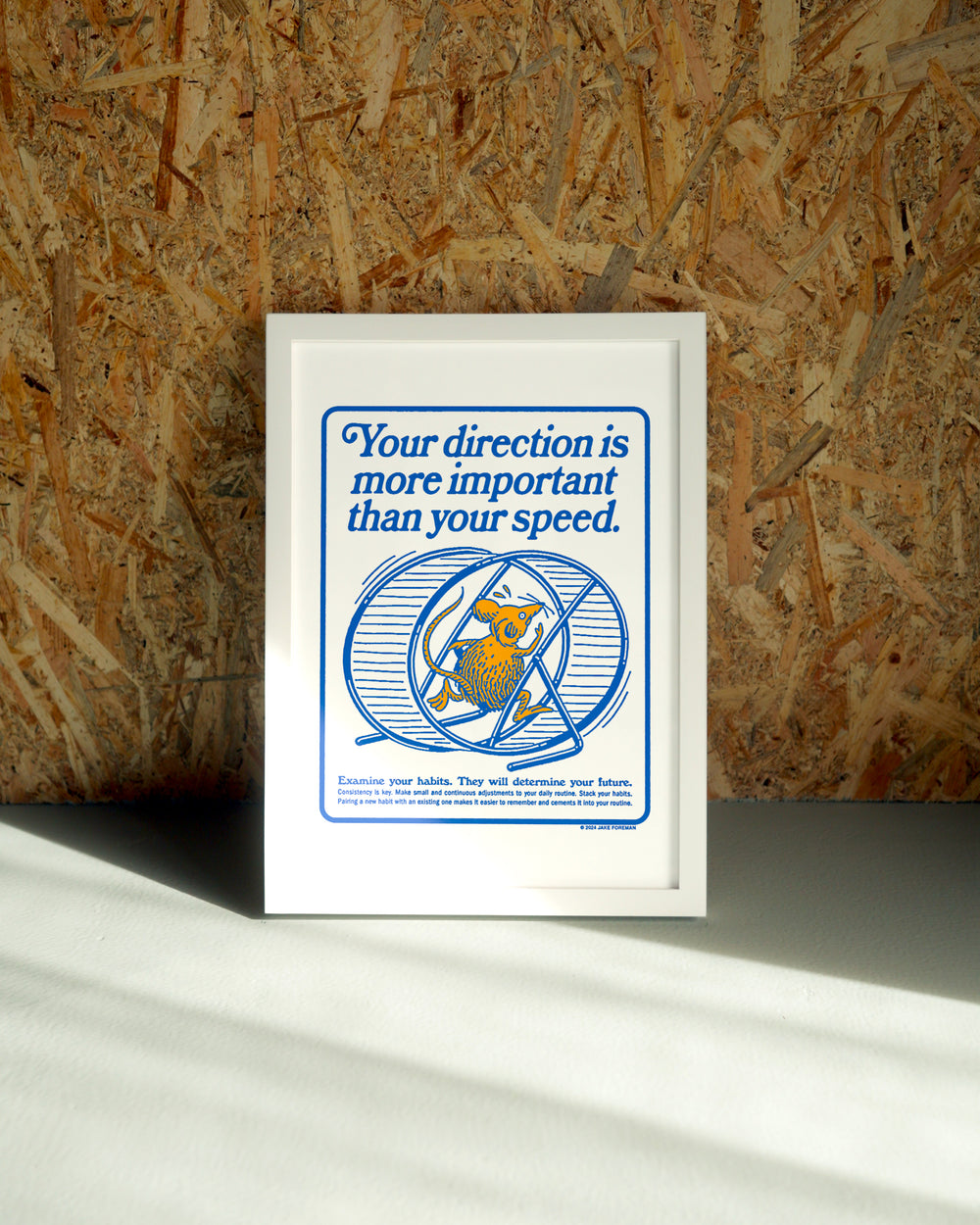 Direction wall art by Jake Foreman in a white frame