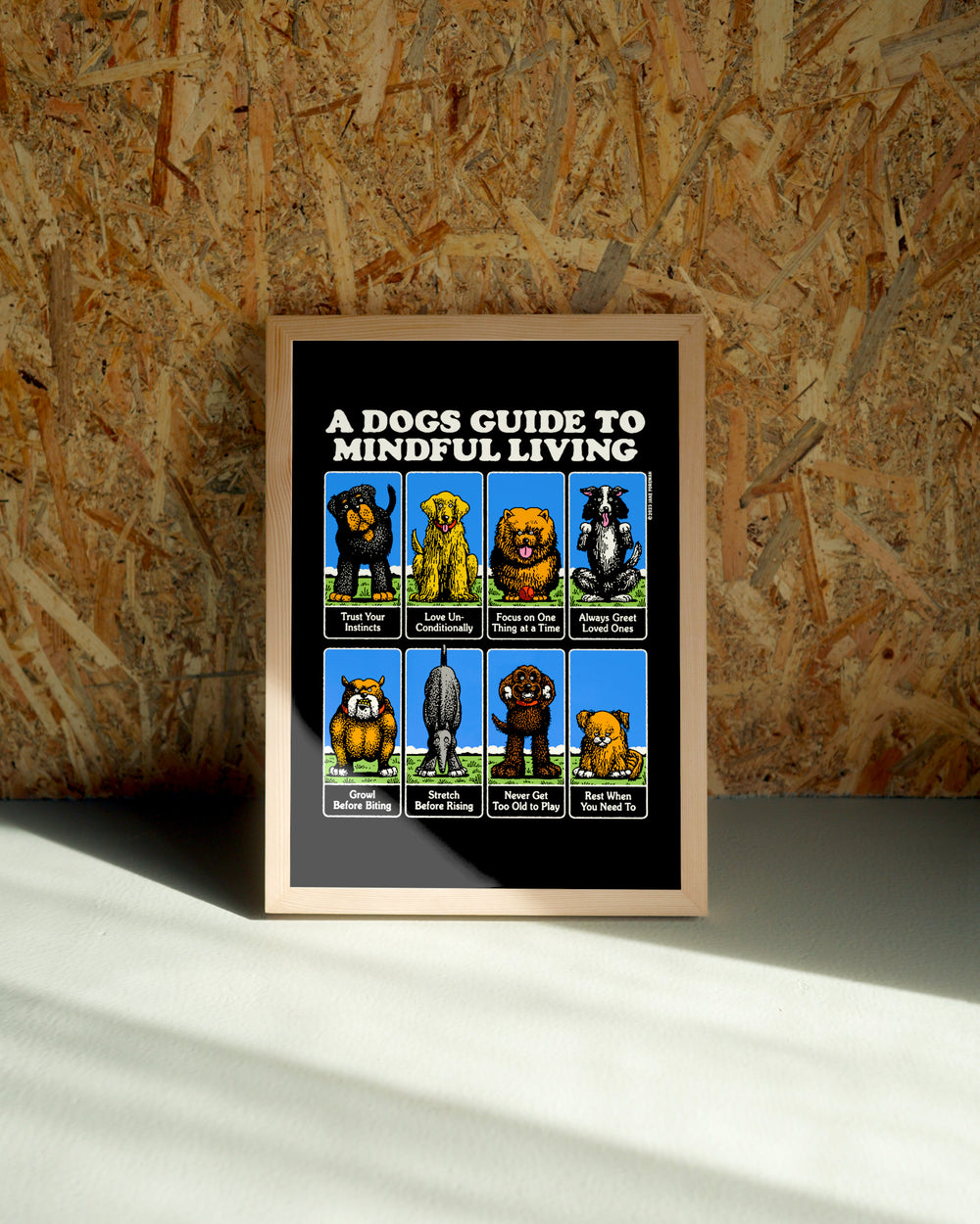 Dogs wall art by Jake Foreman in a natural wood frame