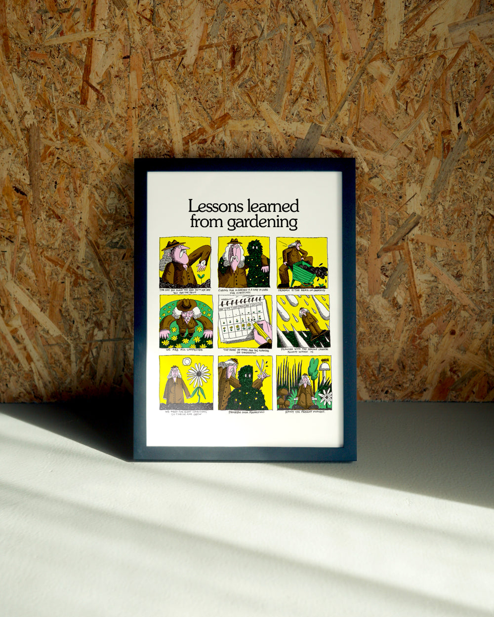 Gardening wall art by Jake Foreman in a black frame