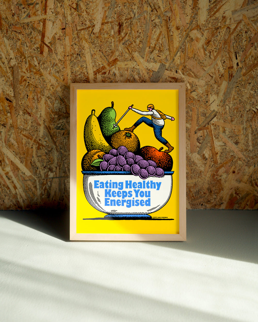 Healthy wall art by Jake Foreman in a natural wood frame