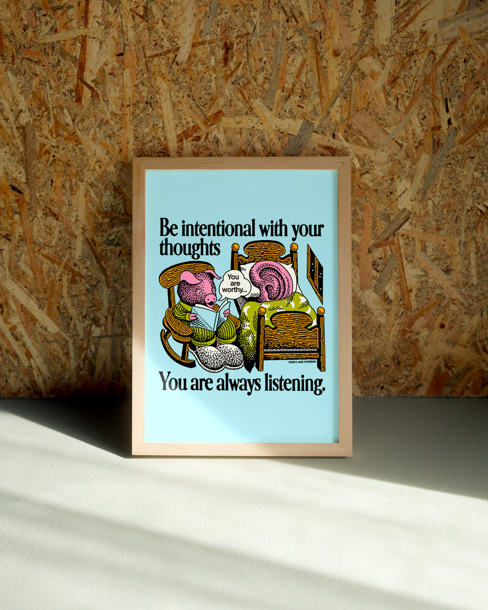 Intent wall art by Jake Foreman in a natural wood frame