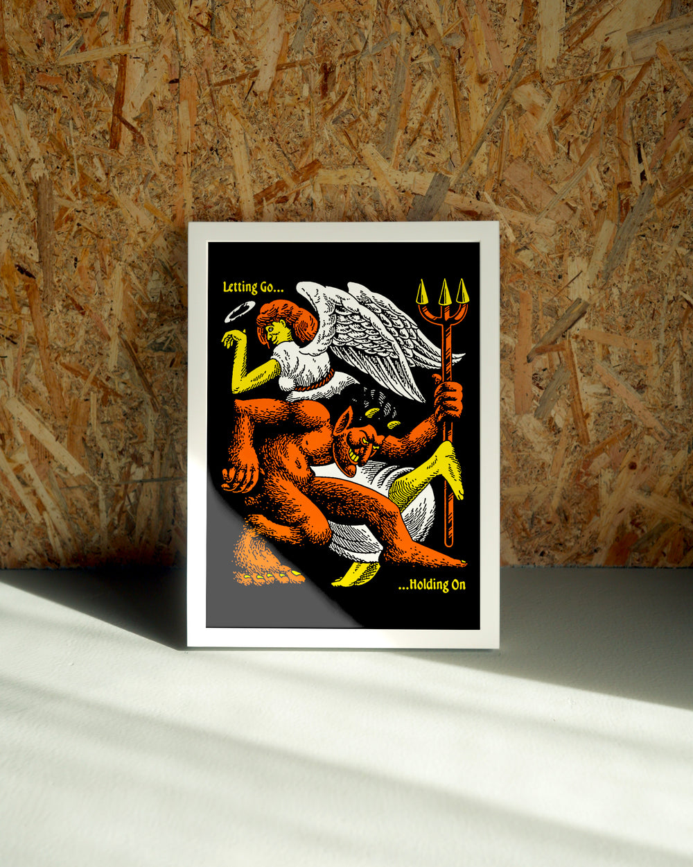 Let Go wall art by Jake Foreman in a white frame