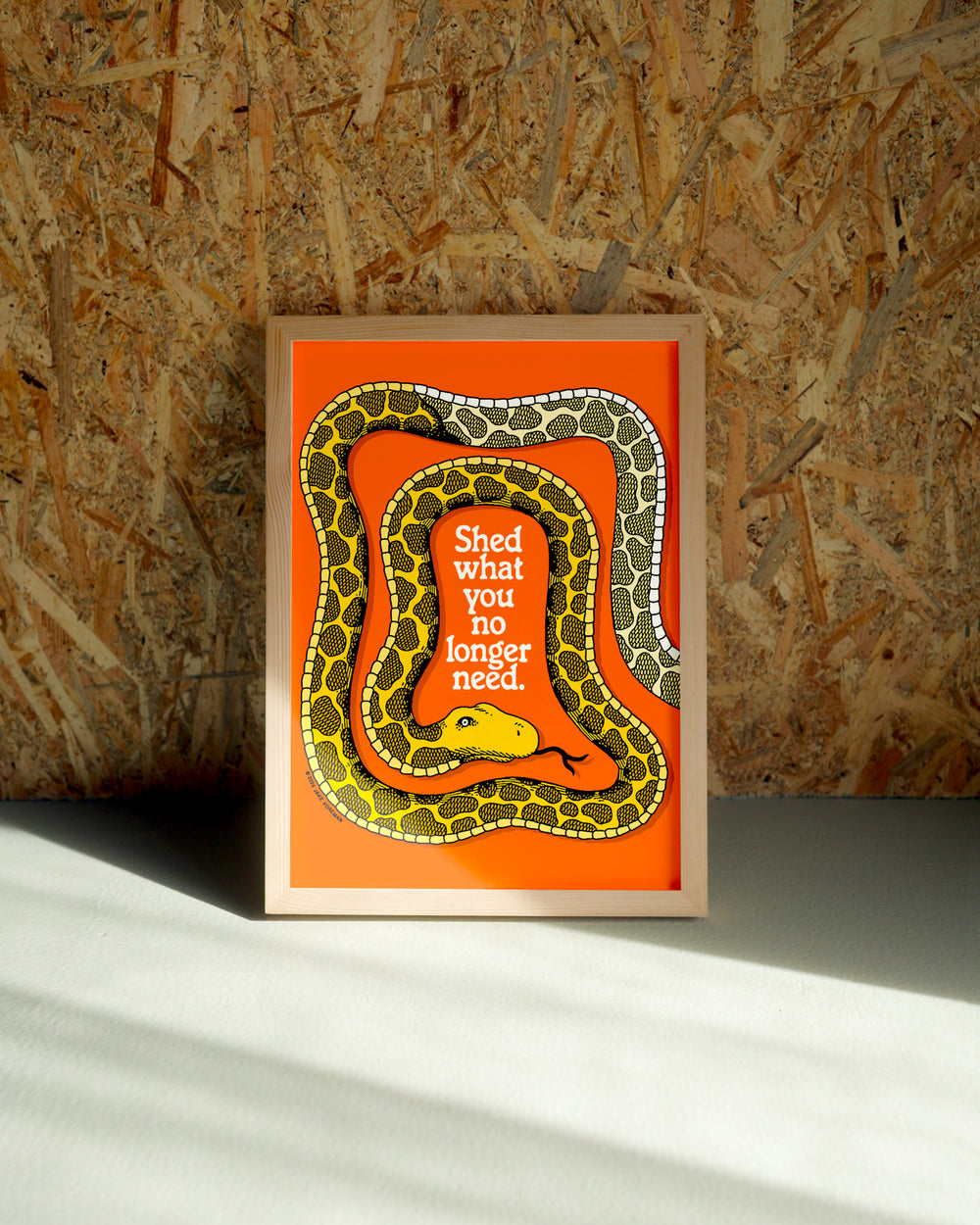 Shed wall art by Jake Foreman in a natural wood frame