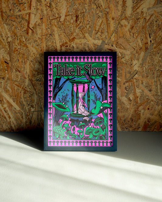 Take It Slow wall art by Jake Foreman in a black frame