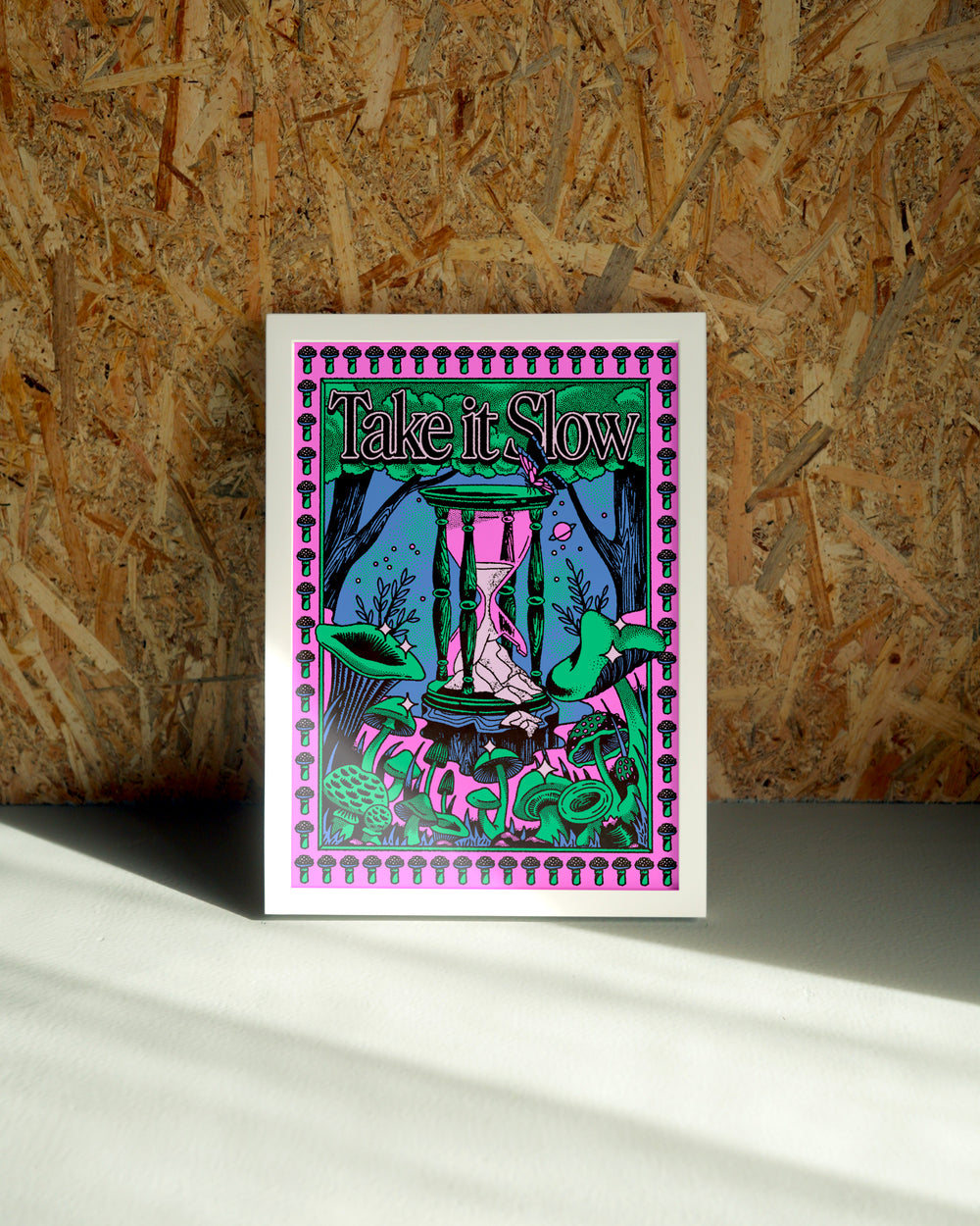 Take It Slow wall art by Jake Foreman in a white frame