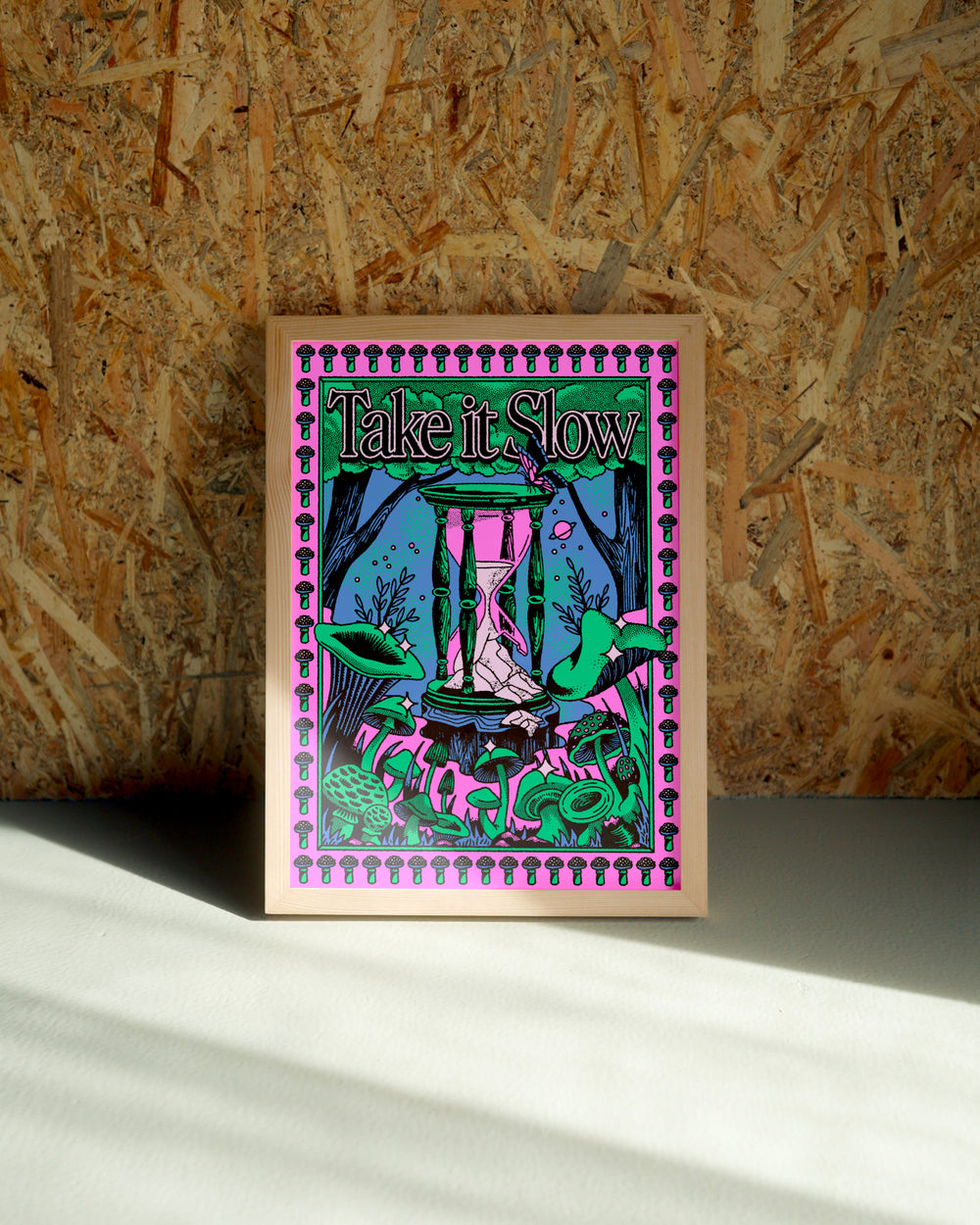 Take It Slow wall art by Jake Foreman in a natural wood frame