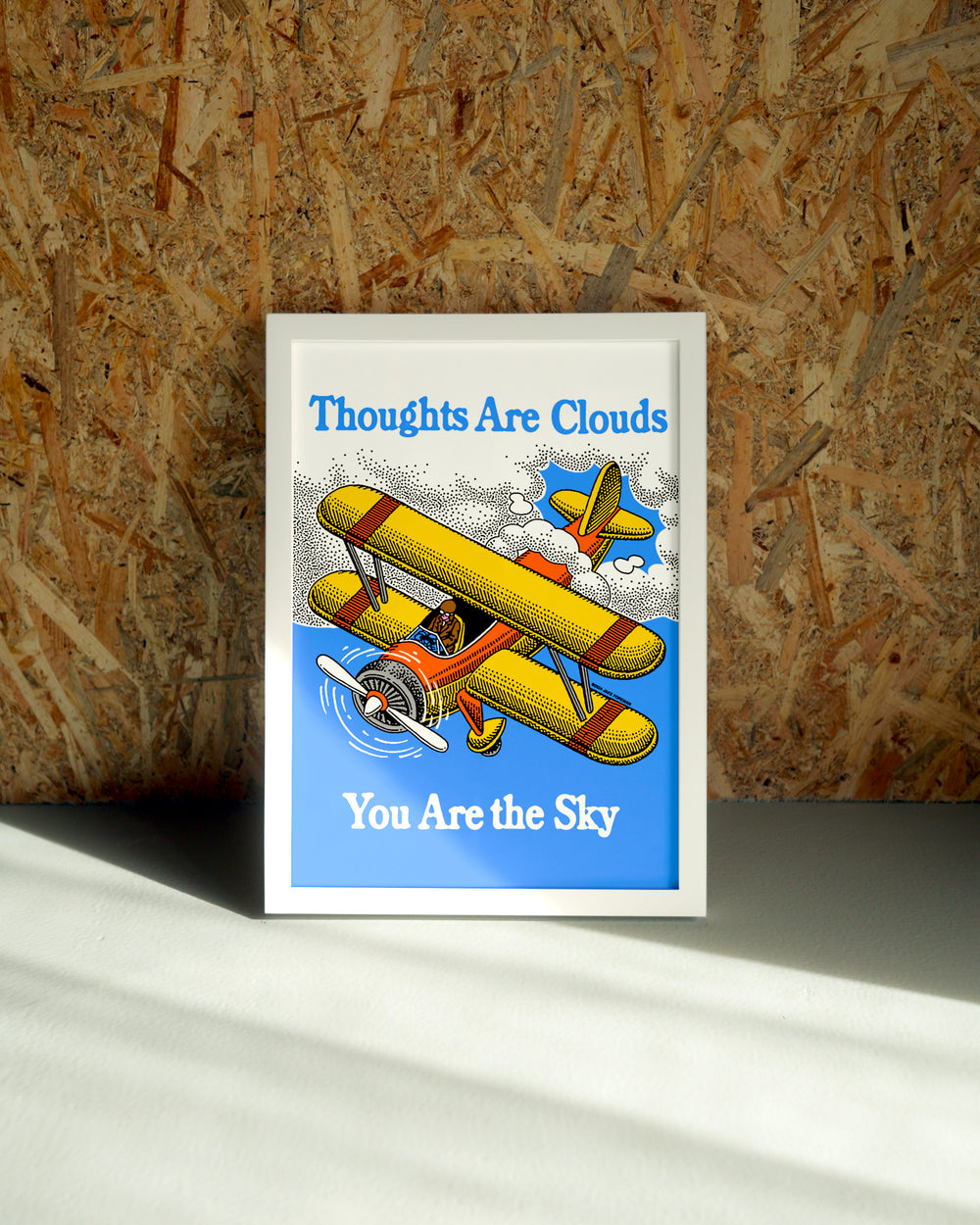 Thoughts wall art by Jake Foreman in a white frame
