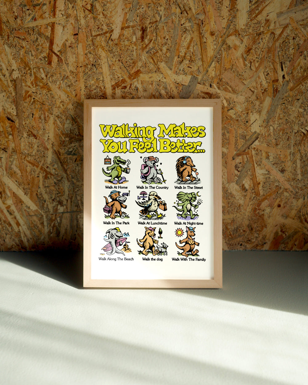 Walking wall art by Jake Foreman in a natural wood frame